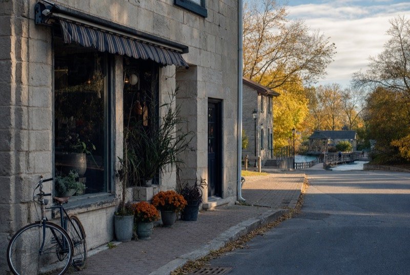 An independent shop in an older stone building on the corner of a historic main street